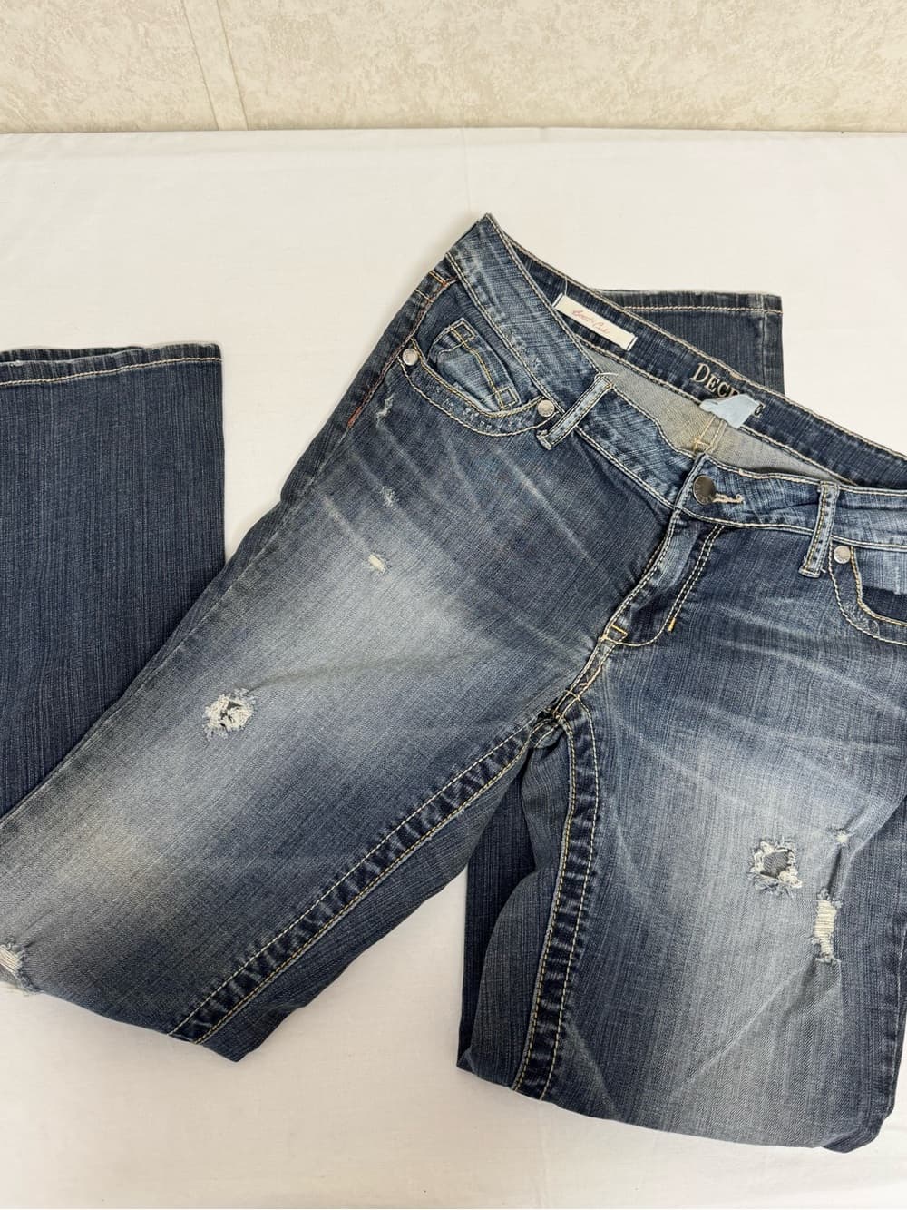 Decree Distressed Women's Boot Cut Jeans in Faded Blue Denim