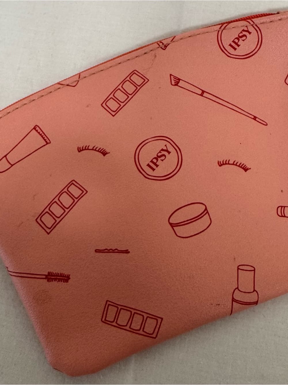 ipsy Coral Pink Cosmetic Pouch with Beauty Icon Print